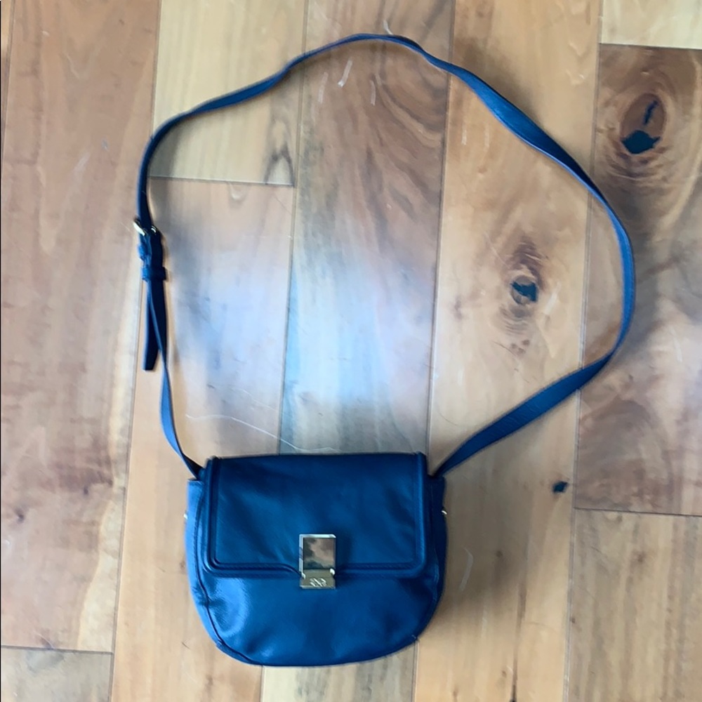 C. Wonder leather Crossbody purse